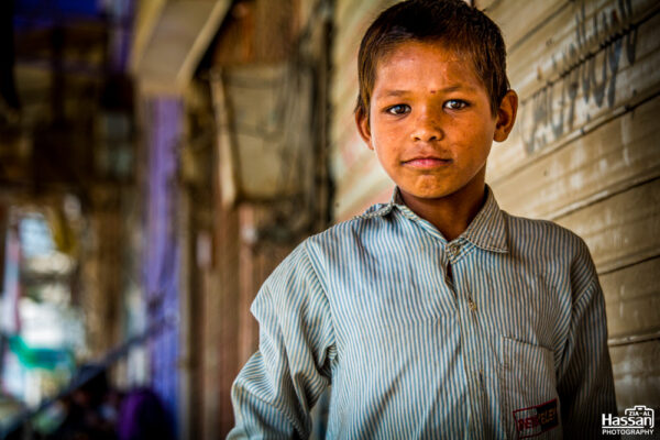 Life Is Not Easy. Boy Collects Waste Paper And Plastic Form Roads And Hoping For Good Future.